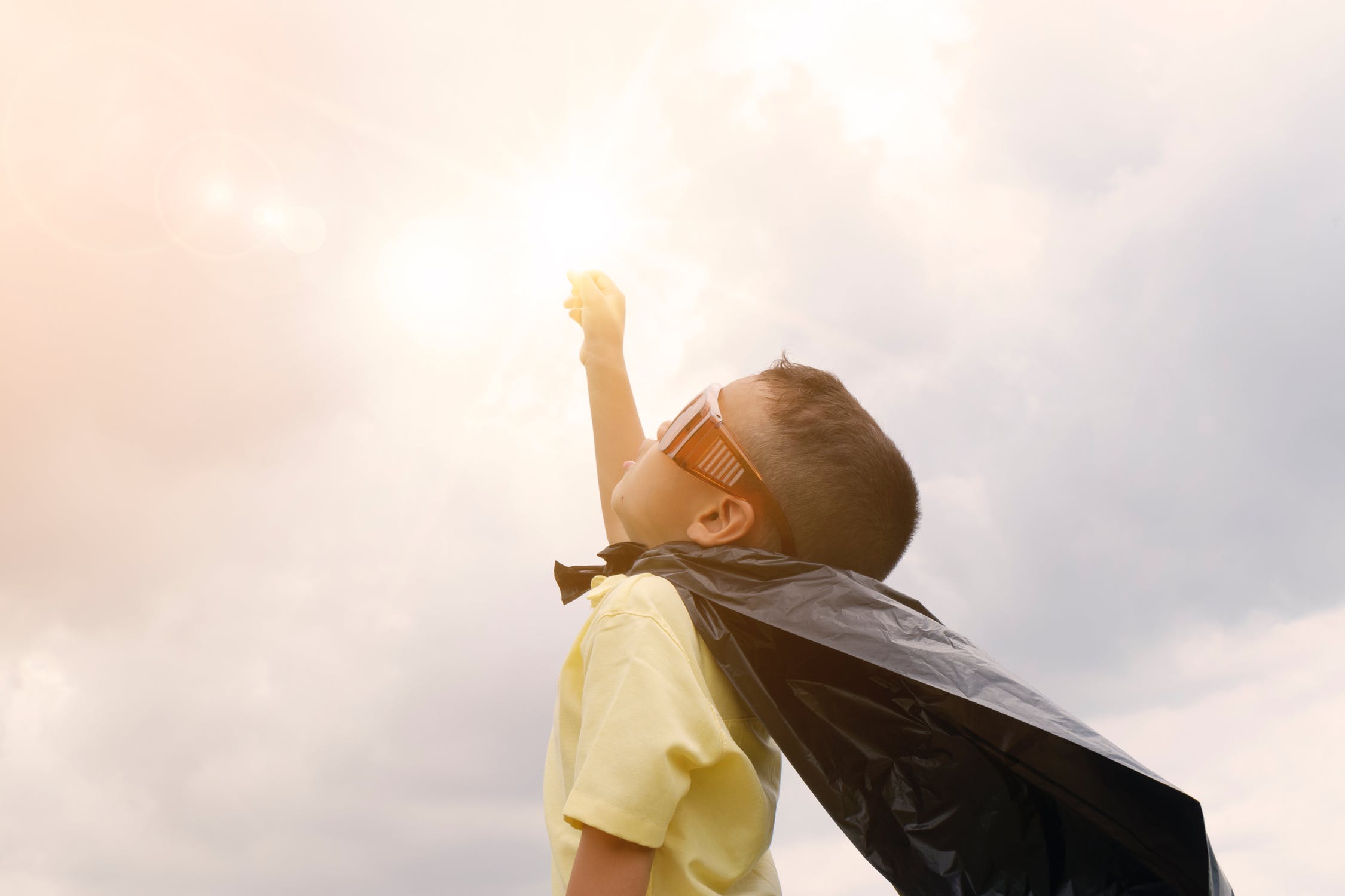 boy raising hand